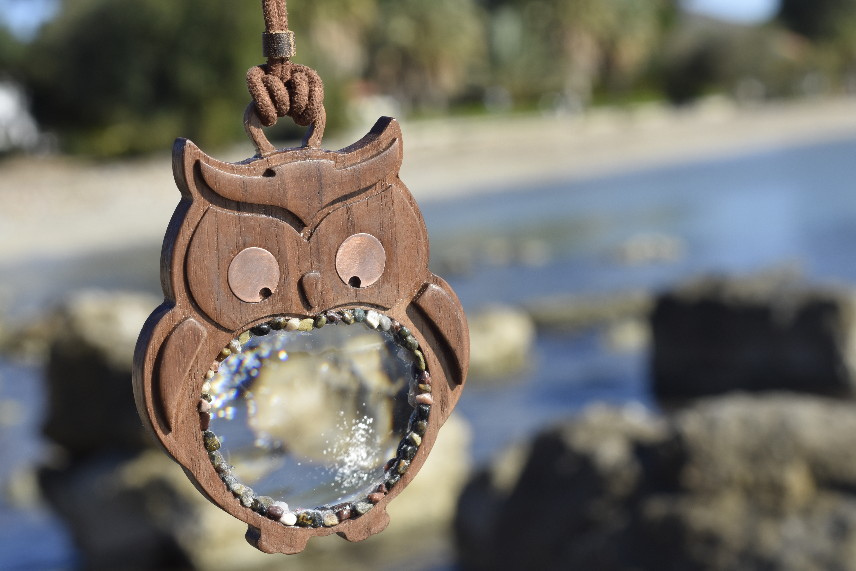 Is your necklace a magnifying glass or an owl-themed accessory? For you, a combination of padauk wood, natural stone, and copper.