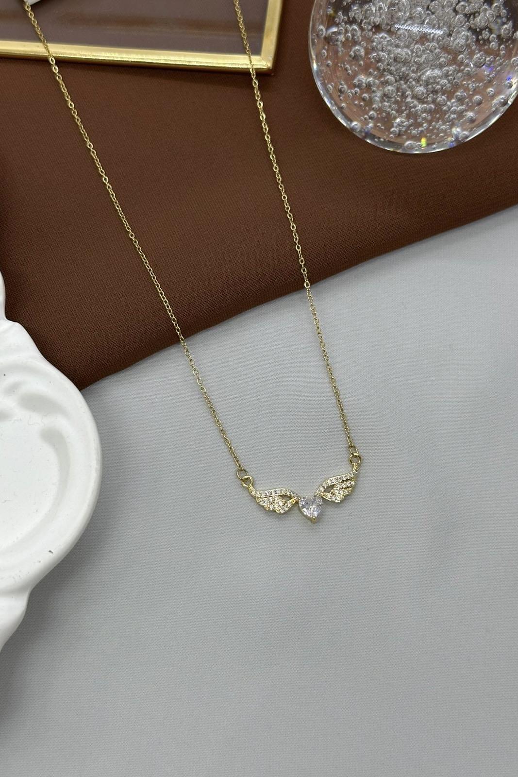 Kanatlı Beyaz Kalp Gold Çelik Kolye