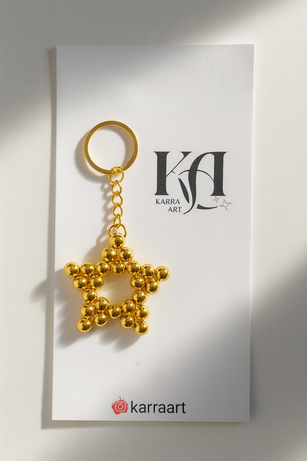 El Yapımı Altın Boncuklu Yıldız Anahtarlık – Karra Art (KARTSIZ)